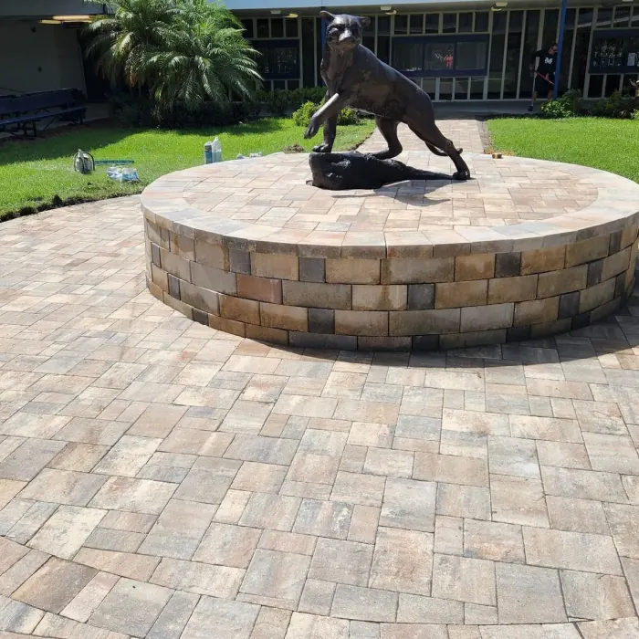 Circular paver plaza with a raised planter