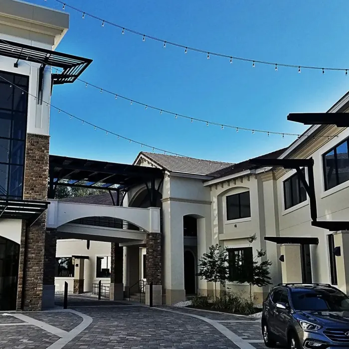 Paver courtyard drive at a multi-story building