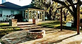 Fire pit patio under mossy oaks