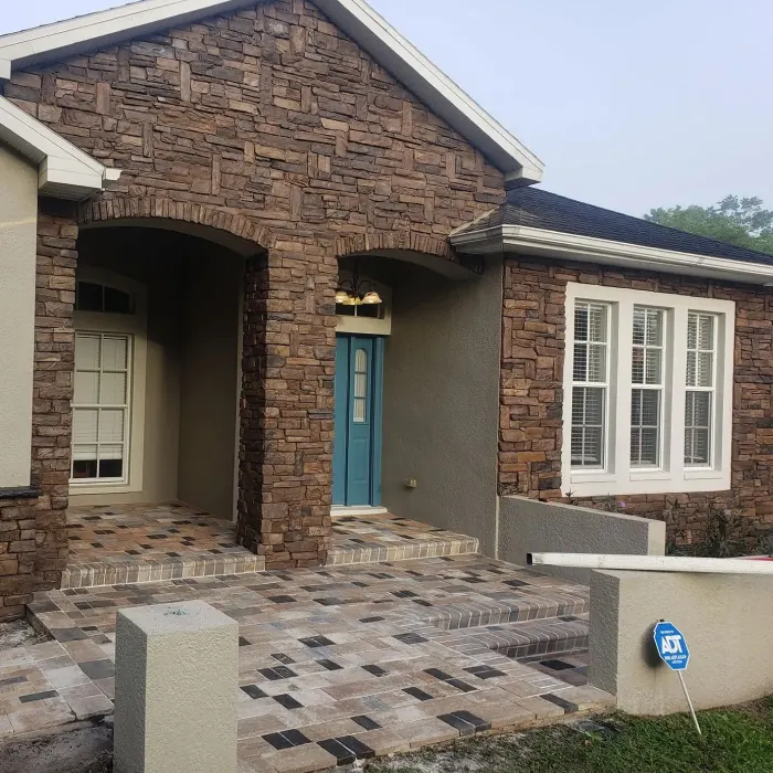 Paver front entry at a brick home
