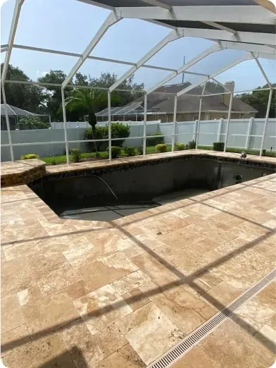 Paver deck inside a screen enclosure